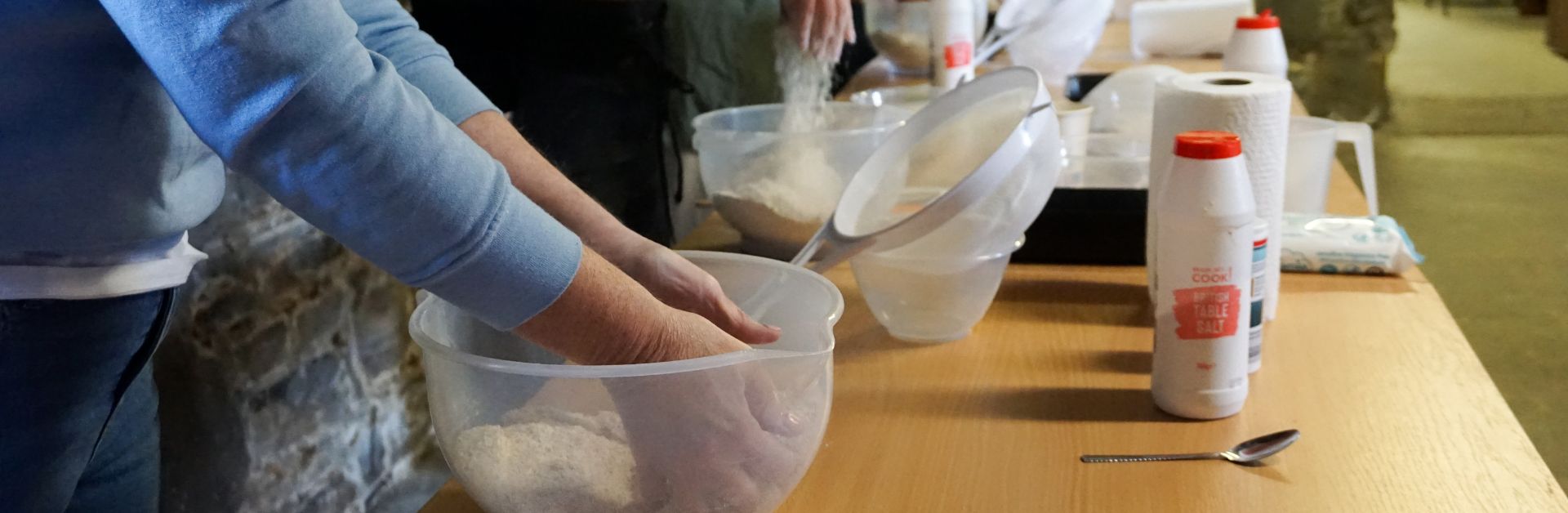 Group making bread during a summer Bread Baking Experience at Martry Mill
